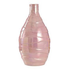 a pink glass vase sitting on top of a white table