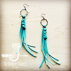 Indulge in the perfect blend of boho and chic vibes with our Leather Fringe Earrings with Turquoise Chunks. These stylish earrings boast a unique fringe design and are adorned with stunning turquoise chunks, making them the perfect statement piece for any outfit. Elevate your look and add a touch of sophistication with these must-have earrings. Approx. Length: 5" from hoop to leather fringe end and Tied with a wax thread Although your item will resemble the photo, each piece is created by hand, Leather Fringe Earrings, Turquoise Stone Jewelry, Record Painting, Small Business Inspiration, Chic Vibes, Iron Orchid Designs, Stylish Earrings, Ecommerce Website Design, Jewelry Catalog