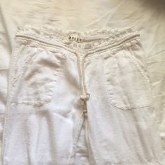 White, Flowy Pants By Roxy! Size Medium, Never Worn. In Excellent Condition. Nwot. Great For A Beach Day In The Summer! Casual White Capris For Loungewear, Cotton Mid-rise Bottoms For Vacation, Casual Cotton Capris For Day Out, Spring Mid-rise Cotton Sweatpants, White Mid-rise Capris For Summer, Casual White Mid-rise Capris, Relaxed Fit Cotton Capris For Day Out, Short Cotton Capris With Elastic Waistband, White Straight Leg Casual Capris