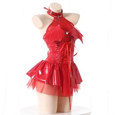 a mannequin wearing a red dress and choker