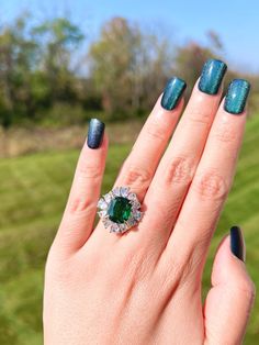 Green Crystal RING Classic Three Stone Luxury Vibrant Green Emerald Halo Ring Aug Birthstone Emerald Earring Neon Glowing Ring ♥ Ready to ship ♥ The main stone is the Finest Doublet Emerald. ♥ Absolutely gorgeous and beautifully handcrafted Finest Doublet Emerald in an exquisite setting. ♥ This classic yet trendy Jewelry makes the perfect Christmas/Anniversary/Valentine's/Birthday gift for her that will be treasured forever. We have confidence that the beautiful and sparkling piece will get her Green Emerald Halo Ring As Gift, Green Emerald Halo Ring, Emerald Halo Ring For Promise, May Birthstone, Luxury Green Emerald Halo Ring, Luxury Green Gemstone Halo Ring, Green Emerald Ring, Emerald Earrings, Classic Ring, Halo Rings