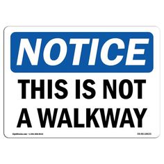 a blue and white sign that says notice please stay in walk way with the words