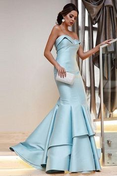 This is a made-to-order product. This elegant sky blue gown with a unique fold strapless sweetheart neckline & everyone's favorite open back design. You'll turn heads in this effortlessly beautiful gown. Stylish mermaid skirt with box pleats details. This dress can be custom made to your exact measurements & is available in more colors. Made from satin fabric to hug your curves. *Colors may photograph differently under studio lighting. Custom size is recommended, totally free. If you can't find Blue Satin Prom Dress, Gowns Gold, Mermaid Cocktail, Robes Glamour, Red Mermaid, Gold Mermaid, Green Prom, Mermaid Evening Gown, Prom Dresses 2018