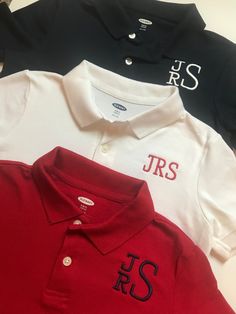 What a fun way to send your little one off to school. Available in Navy, White, Red, Light Blue and Black. School uniform shirts are personalized to your specifications - Choose your shirt color and thread color to coordinate with your school! At checkout (in the Notes to Seller section) please provide the following: 1. Name or initials for monogram. Please provide initials in the EXACT order they will be embroidered. Boys: first, middle, last order. EX: Ben Joe Smith = bjS Include full name to Short Sleeve Shirt With Name Print For School Events, School Monogram Shirts, Casual School T-shirt With Name Print, Cheap Custom Embroidered School T-shirt, Black School Uniform, Monogrammed Short Sleeve Cotton T-shirt, Uniform Shirt, Boys School Uniform, Uniform Shirts