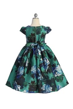 Swathed in a beautiful watercolor floral print and crafted from smooth mikado fabric, this dress is sure to impress. The elegant cut and simple silhouette make it perfect for everything from a picnic to a special event. Comes in 3 gorgeous colors and features cap sleeves, a pleated skirt, and a sash tie. Designer and Style Number: AS546 Kids Dream Fabric and Details: 100% Mikado Polyester, Lining: 100% Polyester, Dry Clean, Zip Fastening, Knee Length, Made in USA Colors: Royal Blue, Baby Blue, G Spring Satin Dress For Dress-up Occasions, Summer Floral Print Dress For Dress-up, Floral Print Dress For Summer Dress-up, Green Floral Print Dress For Dress-up Occasions, Elegant Floral Print Dress For Dress-up, Summer Satin Dress For Dress-up Occasions, Green Floral Print Dress For Dress-up, Green Satin Dress For Garden Party, Spring Floral Print Dress For Dress-up