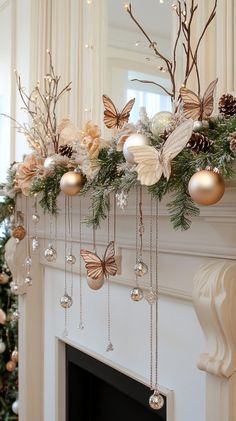 a fireplace mantel decorated for christmas with gold and silver ornaments, pine cones, balls, and butterflies