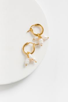 Cove Triple Pearl Earrings WOMEN'S EARINGS Cove Accessories Pearl OS Pearl White Dangle Hoop Earrings With Pearl Charm, Hoop Earrings With Pearl Pendant, White Dangle Hoop Earrings With Pearl Charm, White Hoop Huggie Earrings With Pearl Charm, White Pearl Huggie Hoop Earrings, White Pearl Charm Dangle Huggie Earrings, White Small Hoop Pearl Chain Jewelry, White Pearl Chain Small Hoop Jewelry, Gold Pearl Earrings