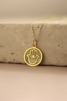 Gold Hamsa Fatima Pendant - Hamsa Fatima Gold Necklace ● Material of pendant: Solid Gold 14k ( REAL GOLD ) ● Metal Stamp: 14k ( REAL GOLD ) ● The pendant is available in 5 sizes: - 12,7 mm / 0.5 inches (Diameter) - 14,0 mm / 0,55 inches ( Diameter ) In the photos - 15,3 mm / 0.6 inches ( Diameter ) - 16,5 mm / 0,65 inches ( Diameter ) - 19,1 mm / 0,75 inches ( Diameter ) ( In the photos the size is 14mm / 0.55 inches Diameter ) ( Jump Ring inner diameter: 4 mm ) ● Material of chain: Solid gold 1 Handmade Yellow Gold Necklaces For Blessing, Handmade Yellow Gold Necklace For Blessing, Symbolic Round Necklace For Blessing, Traditional Gold Necklaces For Mother's Day, Traditional Gold Necklace For Mother's Day, Traditional Gold Necklaces With Charms, Traditional Gold Necklace With Charms, Yellow Gold Round Necklace For Blessing, Traditional Personalized Yellow Gold Necklace