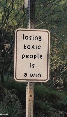 a sign that says losing tonic people is a win