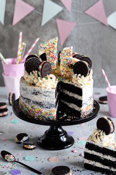 a cake with oreo cookies and sprinkles on it