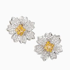 Lavish and bold pair of earrings with Yellow Canary Diamonds set in 18k yellow gold, surrounded by 4.02 carat Pave diamonds set in 18 karat white gold. 4.02ct t.w. round brilliant cut diamonds, G color, VS clarity 0.80ct t.w. round brilliant cut Yellow diamonds, VS clarity 18k white gold Luxury White Clip-on Diamond Earrings, White Diamond Clip-on Earrings, 3d Printed Necklace, Yellow Canary, 3d Printed Earrings, Canary Diamond, Pave Jewelry, Yellow Diamonds, Precious Jewels