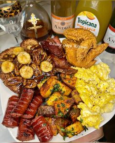 a white plate topped with different types of breakfast foods