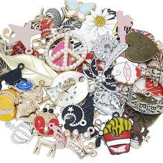 a pile of assorted pins and charms