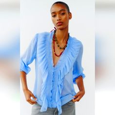 Ruffled Blouse Size M Light Blue By Zara Made In Turkey Blue V-neck Blouse For Office, Light Blue V-neck Blouse For Daywear, Light Blue V-neck Top For Office, Zara Light Blue Workwear Blouse, Zara Blue Summer Blouse, Summer Blue Zara Blouse, Elegant Blue Blouse For Daywear, Chic Blue Summer Blouse, Light Blue Feminine Blouse For Summer