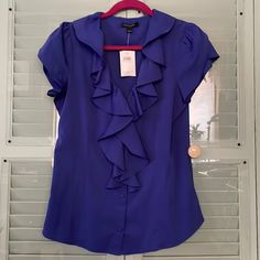 Nwt Banana Republic Factory Royal Blue Ruffle Top Size Medium Ruffle Neck And Petal Sleeves Extra Button Is Included In Envelope 24” Length Blue Ruffled Tops For Office, Blue Office Blouse With Ruffles, Blue Ruffled Tops For Formal Occasions, Formal Blue Ruffled Tops, Blue Ruffle Top, Petal Sleeves, Full Sleeve Top, Ivory Blouse, Paisley Print Blouse