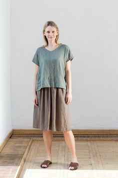 "Handmade with love and care Oeko-tex certified 100% linen skirt which is crafted by local tailors in Lithuania (EU member). It goes perfectly with any of our blouses (you will find below some recommendations)! Look sharp all day long! Length: ±24\"/60cm Pockets: side seam Waistband: elastic Details: *Colour shown: wood brown (1st picture) *Model is wearing size M *High-waisted *Deep pockets *Medium weight (185 g) *Not-ironed (and no need to) *Handcrafted by @LinenCloud Easy care: - Machine wash Casual Linen Tiered Skirt, Casual Linen Tiered Skirt Bottoms, Casual Linen Gathered Skirt, Casual Linen Pleated Skirt, Casual Linen Gathered Skirt Bottoms, Casual Linen Lined Skirt, Linen Skirt With Relaxed Fit And Lining, Green Linen Relaxed Fit Skirt, Linen Green Lined Skirt Bottoms