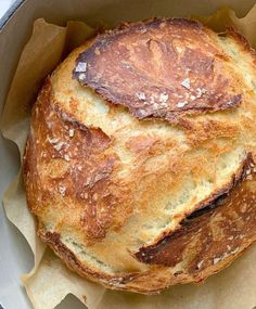 a loaf of bread sitting in a bowl