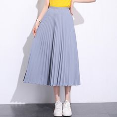 Exude elegance and class in our Solid Pleated Ankle Length Skirt. Featuring a long fit and elasticated waistband, this skirt is sure to keep you feeling comfortable and looking stylish all day long. Perfect for everyday wear, this versatile piece may be paired with a sweater or blouse for an effortlessly chic look to wear for casual days out or informal settings. Stretch Pleated Midi Skirt, Stretch Lined Midi Pleated Skirt, Stretch Midi Pleated Skirt With Lining, Ankle-length Solid Lined Skirt, Stretch Midi Skirt With Elastic Waistband, Long Stretch Pleated Skirt With Elastic Waistband, Solid Ankle-length Lined Skirt, Solid Color Ankle-length Lined Skirt, High Waist Stretch Pleated Skirt