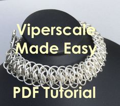 I won the 2015 NM State Fair Jewelry Competition with the Viperscale chain maille design. Learn to make it yourself with this PDF tutorial. 12 pages, 34 close up images. NOTE: DesertChains is the new shop name for ChainOfBeauty, as of January 5, 2023. In one PDF jewelry tutorial download, you get all the instructions, images, and tips for making the Viperscale chain maille weave. This tutorial will walk you through each step, with lots of pictures and instructions. Make your own chainmaille jewelry with this tutorial. NOTE: This tutorial is included in the 7-weave combo tutorial: https://www.etsy.com/listing/488434999/ "Viperscale Made Easy tutorial" is my 6th chain maille tutorial. I spend a lot of time making sure they are easy to follow and understand. Pictures are cropped closely for g Chain Maille Patterns Jewelry Making Tools, Chainmaille Jewelry Tutorial, Chainmail Patterns, Chainmaille Tutorial, Chainmail Jewelry, Chain Maille Jewelry, Chain Maille, Make Your Own Jewelry, Shop Name