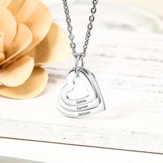 Carry those special names right on your heart! The Hollow Heart Sterling Silver Necklace features a hollowed out heart dangling on a silver chain with your choice of three engraved names. This is such a touching custom made gift to give the one you love. This woman's personalized necklace is made with sterling silver that will never fade, rust, tarnish, corrode or cause allergy. Grab this as a gift for your girlfriend, mother, wife, or any special woman in your life. Wear this everyday or send i Personalized Charm Necklace, Engraved Pendant, Family Necklace, Friendship Necklaces, Mom Jewelry, Name Jewelry, Gifts For Your Girlfriend, Engraved Necklace, Personalized Necklace