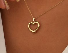 14K Solid Gold Heart Necklace, 14K Real Gold Love Necklace, 14K Gold Friendship Necklace,Solid  Gold Hearts Necklace, Gift For Girlfriend Features  * Necklace Length: 14" to 24" (inches)  * Pendant Width: 0,80 inch  * Pendant Height: 0,80 inch  * Chain Style: Cable  * Closure: Spring Ring  * Production Techniques: Completely Handmade  * Material: High Quality 14 K Solid Gold  * Color Options: Silver, Gold Plated, Rose Gold Plated  * Package: Jewelry Box  ❤️ Please contact us about any questions Yellow Gold Heart Cut Jewelry For Valentine's Day, Heart Cut Yellow Gold Jewelry For Valentine's Day, 14k Gold Heart Necklace With Polished Finish For Anniversary, 14k Stamped Heart Pendant Necklace, 14k Yellow Gold Heart Cut Heart Necklace, Yellow Gold Open Heart Necklace Stamped 14k, Yellow Gold Heart Cut Necklace Stamped 14k, 14k Yellow Gold Open Heart Necklace, 14k Gold Diamond Cut Heart Necklace For Valentine's Day