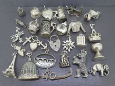 CHOICE of vintage to antique sterling silver (800 (or 80%) silver minimum) charm with most options being European.  Anything unmarked that isn't noted as non-sterling was tested and guaranteed at least 80% silver.  All items also have different sizes/conditions with age related wear so please view photos/video and feel free to ask any questions before ordering, I always try to respond incredibly quick. Jump rings may or may not be sterling silver depending on if they are replacements.  The compl Antique Nickel-free Collectible Charms, Antique Sterling Silver Hallmarked Charms, Antique Sterling Silver Charms For Collectors, Antique Sterling Silver Charms For Collectible, Antique Silver Charms Jewelry For Anniversary, Vintage Silver Charms For Gifts, Collectible Silver Engraved Charms, Vintage Silver Charms For Gift, Silver Engraved Charms For Collectors