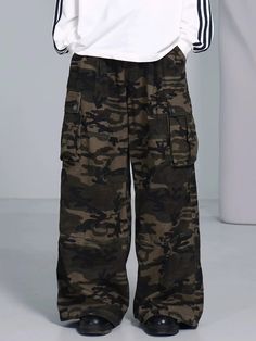 Camouflage Print Wide Leg Cargo Pants Discover the perfect blend of style and functionality with our Camouflage Print Wide Leg Cargo Pants. Designed for comfort and versatility, these cargo pants are perfect for any adventure. Size Chart (in cm): Size S M L XL Length 104 106 108 110 Waist 70 74 78 82 Hip 120 124 128 132 Thigh 70 72 74 76 Combat Style Cotton Parachute Pants For Outdoor, Cotton Combat Cargo Pants For Outdoor, Combat Wide Leg Pants With Multiple Pockets, Baggy Military Style Cargo Pants With Wide Leg, Combat Style Wide Leg Pants With Multiple Pockets, Baggy Military Wide Leg Cargo Pants, Baggy Military Style Wide Leg Cargo Pants, Baggy Wide-leg Military Cargo Pants, Military Style Baggy Wide Leg Cargo Pants