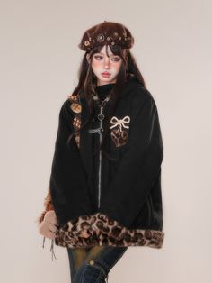 Embrace the ultimate blend of cute and edgy with this adorable hoodie jacket, perfect for adding a touch of kawaii flair to your wardrobe. Featuring a comfortable zip-up closure, this jacket is designed with a hood and adorned with a charming heart-shaped buckle strap at the zip fastening. A single chest area boasts a delightful bow embroidery, intricately combined with a leopard print heart patch, adding a playful yet stylish element to the design. The cuffs, hem, and hood are accentuated with Bow Embroidery, Heart Patch, Leopard Print Jacket, Heart Patches, Print Jacket, Black Bow, Hoodie Jacket, Jacket Tops