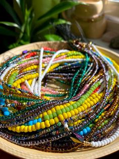 I'm pleased to offer my handmade waist beads to you at wholesale pricing. With these strands you will be able to make at minimum 2x profit off of your initial investment( depending on your markup). All waist beads will be traditional tie-ons on a standard 50inch string. These waist beads will be seed bead and accent beads. As well as a option for crystal waistbeads. There are 3 design options to choose from 1.Intuitive design- Leave it to me and I'll intuitively create all the waist bead strands Colorful Heishi Waist Beads, Handmade Waist Beads As Gift, Handmade Round Waist Beads For Beach, Handmade Festival Waist Beads, Handmade Waist Beads As A Gift, Handmade Waist Beads For Beach, Handmade Bohemian Waist Beads With Oval Beads, Handmade Round Waist Beads For Festivals, Artisan Heishi Beads