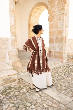 Adopt a bohemian loose-fit look with this rust-colored tribal kimono in 100% cotton. Ideal for cooler summer nights, festivals or ceremonies. Mixed model, suitable for men and women.  ༶ ༶ ༶ ༶ ༶ ༶ ༶ ༶ ༶ ༶ ༶ ༶ ༶ ༶ ༶ ༶ ༶ ༶ ༶ ༶ ༶ ༶ ༶ ༶ ༶ ༶ ༶ ༶ AVAILABILITY The kimono is available in other earthy colors :  - Brown Color : https://www.etsy.com/listing/1781191615 - Creme Color : https://www.etsy.com/listing/1766996840 ༶ ༶ ༶ ༶ ༶ ༶ ༶ ༶ ༶ ༶ ༶ ༶ ༶ ༶ ༶ ༶ ༶ ༶ ༶ ༶ ༶ ༶ ༶ ༶ ༶ ༶ ༶ ༶ MEASUREMENTS DETAILS Our prod Bohemian Shawl Cape For Fall, Traditional Brown Kaftan For Festival, Bohemian Cape With Tassels For Fall, Bohemian Tassel Cape For Fall, Traditional Brown Poncho For Festival, Bohemian One-size Cape For Festivals, One Size Bohemian Cape For Festivals, Bohemian One-size Festival Cape, Hippie Brown Poncho For Festivals