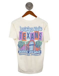 TSU Groovy Landmark Groovy Graphic Print Short Sleeve T-shirt, Fan Merchandise T-shirt For Spring, Spring Fan Merchandise Short Sleeve T-shirt, Purple Short Sleeve T-shirt For Fans, Purple Short Sleeve Tops For Fan Merchandise, Fan Merchandise T-shirt With Front Print For Spring, Groovy White Short Sleeve Tops, White Groovy Short Sleeve Tops, White Short Sleeve Groovy Tops