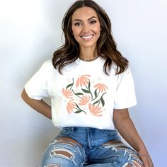 Looking for a cute versatile top to wear this summer? Make sure to grab one of our Pink Daisies garment dyed graphic tees! This soft and comfortable graphic tee is the perfect top for any outfit. It can be paired with biker shorts, jeans, or even a simple skirt/dress! This tee is true-to-size, so be sure to order your regular t-shirt size! If you are looking for a more oversized look, make sure to size up! Daisy Shorts, Pink Daisies, Pink Daisy, Casual Fit, White Ink, Blue Jean, Large White, Casual Fits, Vintage Look