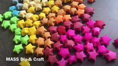 colorful origami stars laid out on the ground