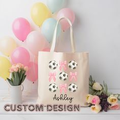 Combine your love for soccer and style with our Custom Soccer and Bows Canvas Tote Bag! This trendy and practical bag is perfect for carrying all your essentials, whether you're heading to practice, school, or a day out. Personalize it with your name to make it uniquely yours or gift it to a soccer-loving friend! Product Details:  * Durable canvas material * Personalized with name  * Spacious interior * Measures - 15" x 16"- perfect for everyday wear * 100% cotton canvas bag  * While the canvas material will show off your designs in great colors, it's durable and will last for years * The bag features 20" handles (made from the same canvas), making it easy to carry  *Do not iron directly over the printed area - print may stick to the iron.; Spot clean; Do not bleach; Line dry. Custom-Order Customizable White Bags For Sports Events, White Tote Bags For Sports Events, White Tote Bag For Sports Events, Customizable White Bag For Birthday, White Sporty Bag As Gift, Sporty White Bag As Gift, Sporty White Bag Suitable For Gifts, Coquette Tote Bag, Bow Tote Bag