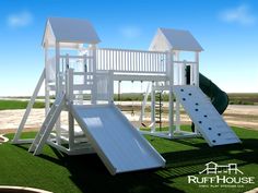 there is a white play set with a slide