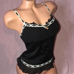 Bebe Black And White Peasant Style Gathered Ruched Pinup Dollbaby Cute Sexy Elegant Retro Rockabilly Americana 91% Silk Fitted Lace Trim Coquette Tops, Elegant Tops With Lace Trim And Ruffled Straps, Fitted Camisole With Lace Trim And Ruffled Straps, Coquette Lace Trim Top For Night Out, Fitted Lace Trim Camisole With Ruffled Straps, Flirty Lace Trim Top For Night Out, Flirty Camisole Top With Ruffles, Fitted Ruffle Tank Camisole, Fitted Ruffled Tank Camisole