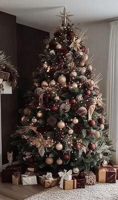 a decorated christmas tree in a living room