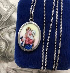 18" Sterling Enamel Mother Mary Necklace, Madonna and Child Pendant, German Virgin Mary Religious Medal Antique Oval Necklaces With Charms, Vintage Enamel Oval Pendant Jewelry, Antique Miraculous Medal Necklace As Gift, Vintage Enamel Oval Pendant Necklace, Antique Miraculous Medal Pendant Jewelry, Antique Miraculous Medal Round Pendant Jewelry, Victorian Jewelry With Miraculous Medal For Gifts, Antique Jewelry With Miraculous Medal Round Pendant, Antique Silver Jewelry With Miraculous Medal