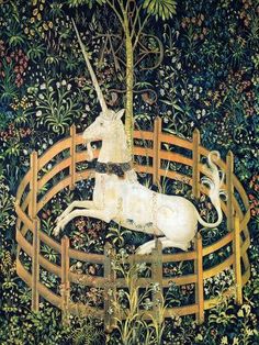 the unicorn is standing on its hind legs in front of an ornately decorated wall