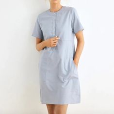 Questions? Leave A Comment Below! Short Sleeve Shirt Dress With Buttoned Pockets For Daywear, Casual Shirt Dress With Buttons For Workwear, Light Blue Cotton Shirt Dress For Work, Casual Button-up Dress For Office, Light Blue Cotton Button-up Shirt Dress, Light Blue Button-up Cotton Shirt Dress, Light Blue Button-up Dress With Pockets, Casual Dresses With Buttoned Pockets For Work, Short Sleeve Dresses With Buttoned Pockets For Work