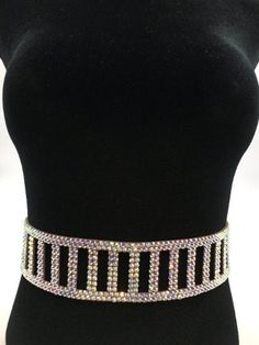 Adjustable rhinestone belt. 100% handmade.  Made of high-quality glass rhinestones and fabric. Width: 2 inches (5 cm) ❤ About belt size. For example, a 23 5/8 - 26 37/64 inch belt will fit a waist size of  23 5/8 - 26 37/64 inches. You can adjust the size in increments of 0.7 inches (1.8 cm).  ❤ Important! The entire belt is covered in rhinestones. Even when you adjust its size, the belt will still be completely covered in rhinestones thanks to the fastening system. It will look beautiful from t Adjustable Rhinestone Party Belts, Fitted Rhinestone Belts For Party, Adjustable Silver Belt With Bling, Adjustable Silver Belts With Bling, Silver Adjustable Belt With Rhinestones, Silver Bling Belts For Party, Elegant Evening Belts With Rhinestones, Luxury Silver Belt With Rhinestones, Silver Party Belt With Bling