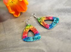 Statement dangle earrings, Rainbow dangle earrings, Colorful earrings, Triangle earrings, Boho earrings, Gift for her 100% HANDMADE AND UNIQUE Looking for a perfect unique gift for a special one or a special treat for yourself? Look no more! Beautiful rainbow dangle earrings made by me with lots of love and attention. Bigger but very easy to wear and combine with different outfits. Great for warm summer days and nights. -------------------------------------------------------- *Material: polymer Rainbow Nickel-free Earrings For Gifts, Nickel-free Rainbow Earrings For Gift, Nickel-free Rainbow Earrings Gift, Colorful Hypoallergenic Dangle Jewelry, Colorful Earrings As A Gift, Rainbow Colorful Earrings For Gift, Colorful Dangle Earrings For Gift, Artsy Multicolor Pierced Earrings, Colorful Dangle Hoop Earrings As Gift