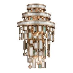 an art deco chandelier with white and gold accents