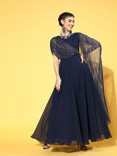 Buy magnificent navy blue georgette partywear solid dresses online at best price from Inddus with free shipping. Festive Blue Georgette Dress, Blue Georgette Evening Gown, Elegant Blue Gown With Sheer Dupatta, Blue Georgette Dress With Sheer Dupatta, Festive Georgette Evening Dress For Party, Elegant Georgette Party Dress, Festive Evening Dress With Sheer Dupatta For Party, Blue Georgette Party Gown, Blue Georgette Dress For Festive Occasions