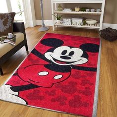 a mickey mouse rug in a living room