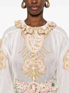 This blouse is like a gentle whisper of elegance with its intricate embroidery and dreamy semi-sheer fabric. It's perfect for adding a touch of whimsy to your wardrobe while keeping things effortlessly stylish. You'll love how it makes every day feel just a bit more special. White ramie semi-sheer construction All-over motif embroidery Ruffle collar Front button fastening with fabric-covered buttons Long puff sleeves with elasticated cuffs Flared design Motif Embroidery, Hair Mousse, Fabric Covered Button, Leather Cap, Mens Fall, Ruffle Collar, Long Puff Sleeves, Sweaters Knitwear, Embroidered Blouse