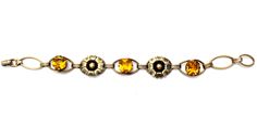 Antique Bracelet - This is a 12K gold filled over sterling silver citrine rhinestones flower bracelet. It is signed PR. ST. CO for Providence Stock Co., hallmarked 1/20 12K on Sterling, 6.25" long, slightly over .5" wide, weighs 8.6 grams. Elegant Gold Citrine Crystal Bracelet, Formal Yellow Gold Jeweled Bracelets, Yellow Gold Jeweled Bracelets For Formal Occasions, Yellow Gold Jeweled Bracelet For Formal Occasions, Jeweled Yellow Gold Bracelets For Formal Occasions, Vintage Gold Jeweled Bracelets, Vintage Jeweled Gold Bracelets, Antique Jeweled Gold Bracelets, Vintage Gold Crystal Bracelet As Gift