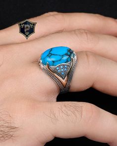 "Turquoise Silver Ring, 925 Sterling Silver Ring, Mens Handmade Ring, Turkish Silver Men Ring, Best Gift, Ottoman Mens Ring ✦ Details ✦ * Material: 925 Sterling Silver * Gemstone: Turquoise  * Weight: 10.00 grams. * The size of the stone: 15x20 mm. * Sides oxidized, decorated with Micro Turquoise stones. * Stamp: 925 * Available sizes; 5 US to 16 US. Contact me if you need any other size! ✦ Shipping ✦ * Processing time: 1-3 business days. * This item ships from my Turkish workshop in Istanbul. * Add your phone number in address box for a smoother delivery. That makes courier personnel's job easier.  ✦ Packaging ✦ * Comes with a luxury gift box and a jewellery cleaning cloth and courtesy gift. ✦ Returns, Exchanges ✦ * Return option available for 30 days after the delivery. * The product has Luxury Turquoise Rings As Gift, Luxury Gift Turquoise Gemstone Ring, Luxury Stamped 925 Turquoise Ring As Gift, Luxury Turquoise Gemstone Ring Gift, Luxury Blue Rings Stamped 925, Luxury Handmade Turquoise Ring For Men, Luxury Turquoise Sterling Silver Men's Ring, Luxury Men's Sterling Silver Turquoise Ring, Luxury Blue Turquoise Ring For Men