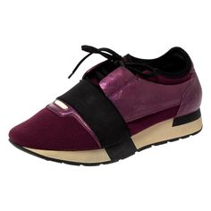 Let your latest shoe addition be this pair of Race Runners sneakers from Balenciaga. These purple sneakers have been crafted from mesh, neoprene, and leather into a chic silhouette. They flaunt covered toes, black strap detailing on the vamps, and tie-up fastenings. They are complete with a leather-lined insole and a tough base to provide maximum comfort when walking. Purple Sneakers, Latest Shoes, The Vamps, Purple Black, Luxury Watches, Purple And Black, Balenciaga, Clothing And Shoes, Baskets