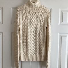 J.Crew Cable Handknit Sweater Classic Turtleneck Chunky Knit Color: Off White 100% Wool Size: M Excellent Pre-Owned Condition. Cable Knit Turtleneck, Classic Turtleneck, Cable Knit Turtleneck Sweater, Knit Turtleneck, Knit Turtleneck Sweater, Hand Knitted Sweaters, Chunky Knit, Turtleneck Sweater, Cable Knit